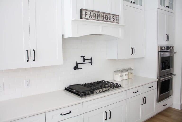 Black Pot Filler Mounted Above Cooktop