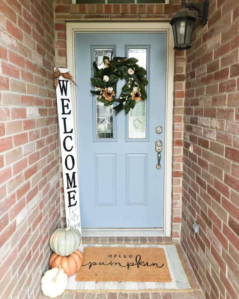 Blue Front Door in Seasonal Doorway