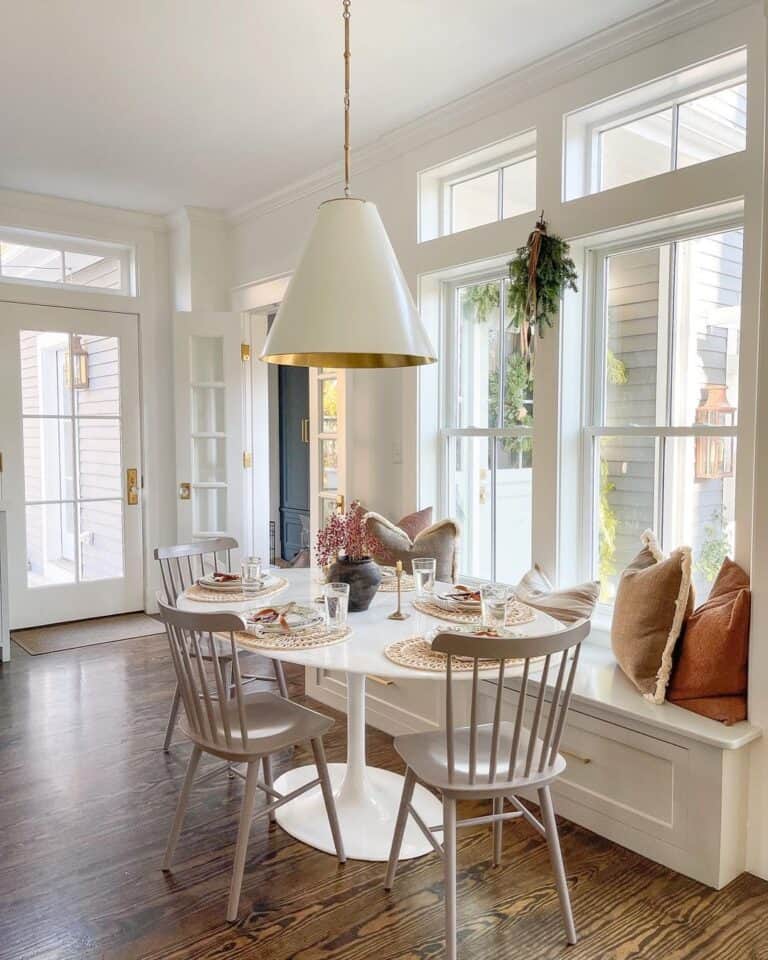 Breakfast Nook With White Farmhouse Table