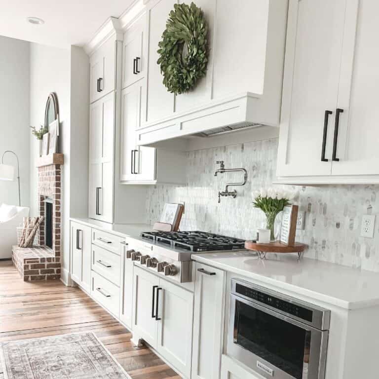 Brick Fireplace and Pot Filler Above Stove