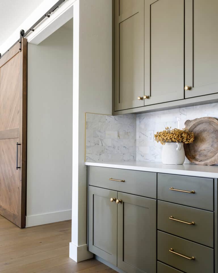 Brown Cabinets with Gold Pulls