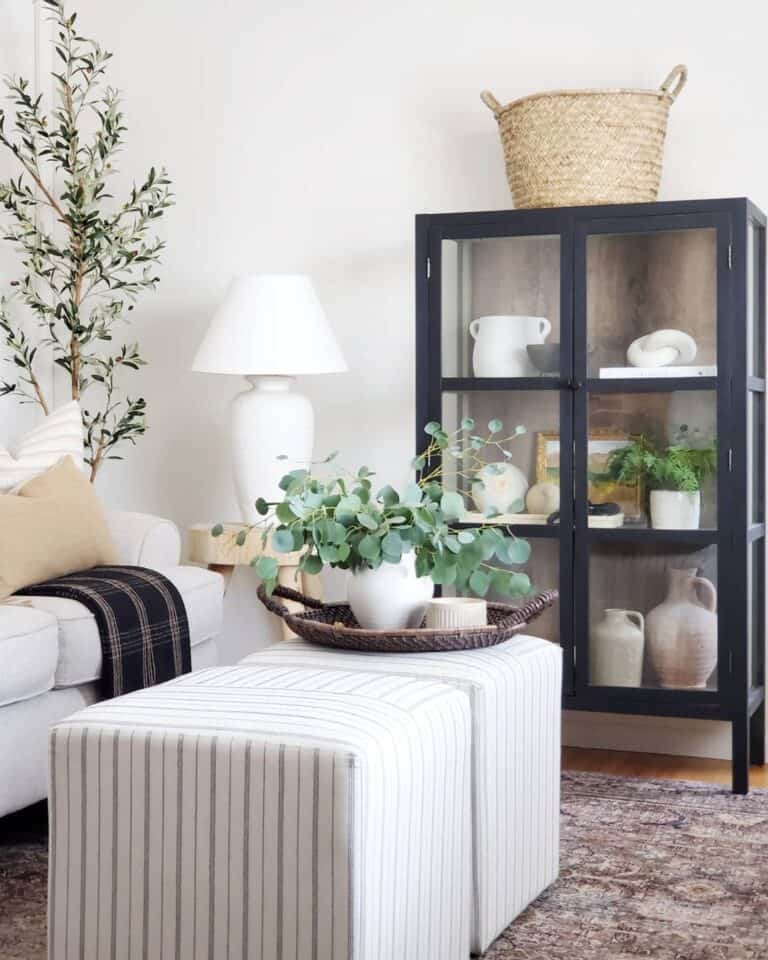 Dark Wicker Tray with Two Striped Ottomans
