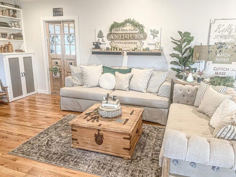 Farmhouse Wall Decor Around Beige Sofas
