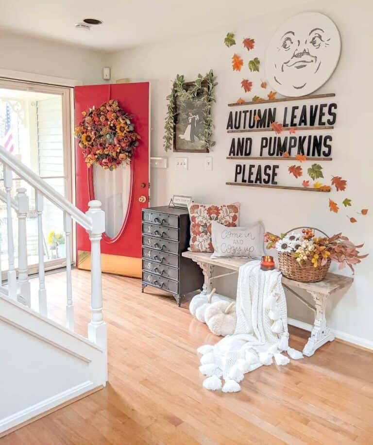 Foyer Includes a Red Front Door With Glass