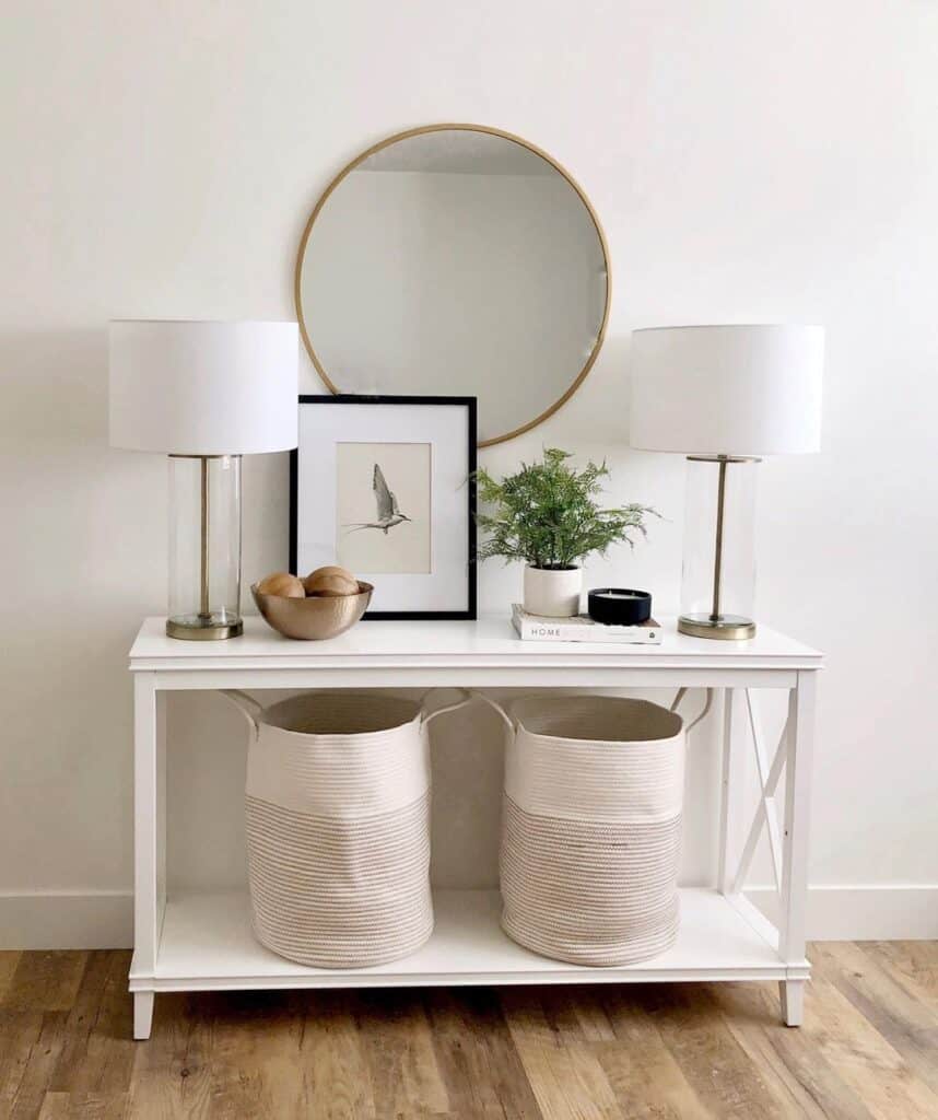 Glass Lamps on a White Console Table