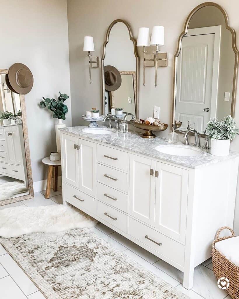 Gold Accent Mirrors & Marble Countertops