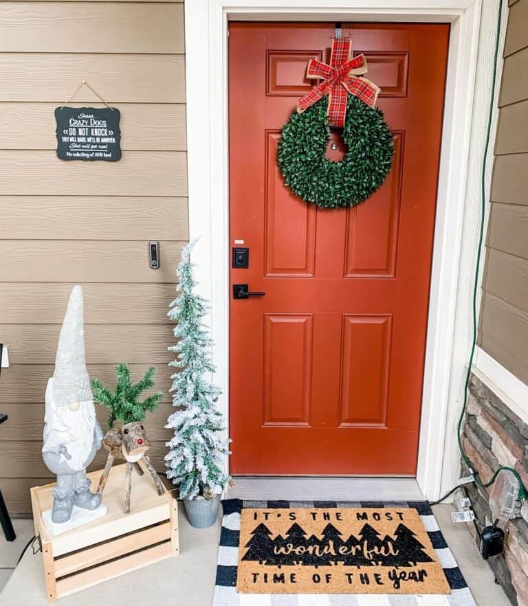 Layered Mats Beneath Red Front Door