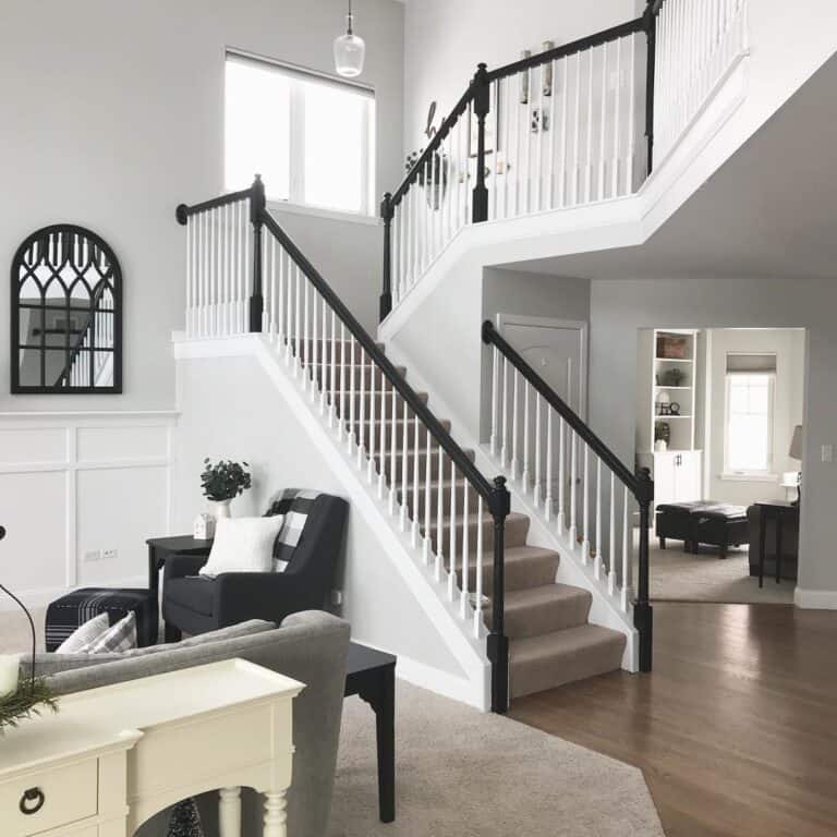 Open Staircase with White Spindles and Black Handrail