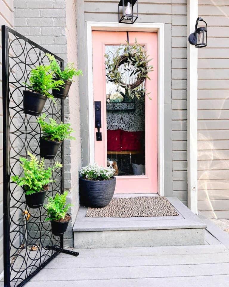 Pink Front Door and Lantern Lighting