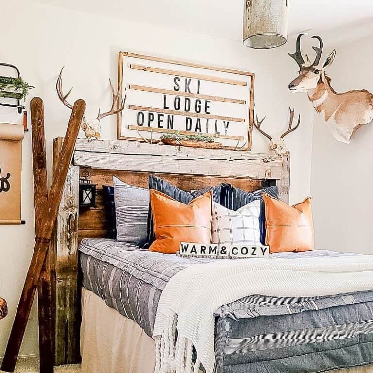 Rustic Ski Themed Bedroom With White Throw