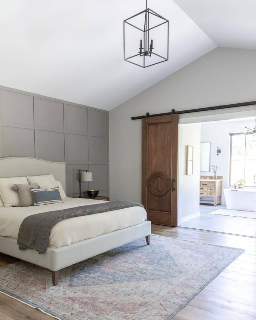 Sloped Ceiling Bedroom with Gray Accent Wall