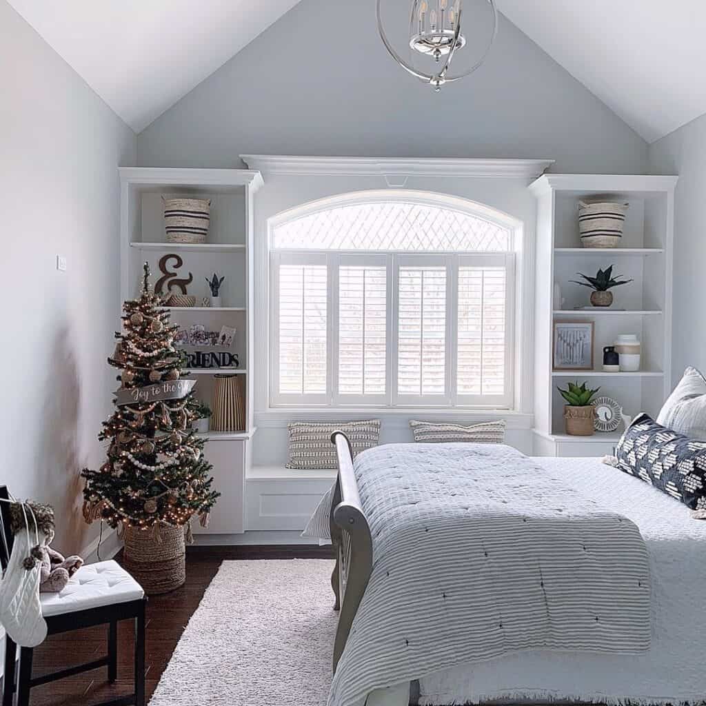 Small Bedroom Christmas Tree Next to a Window Seat
