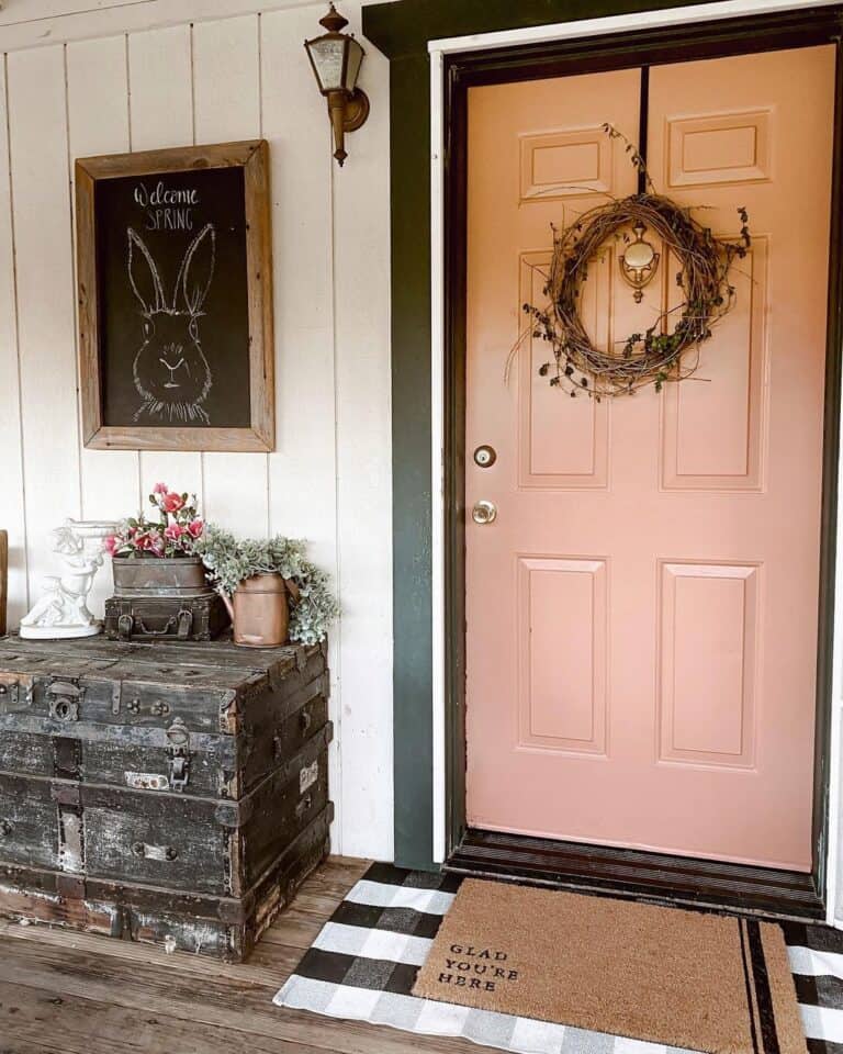 Vintage Style Porch With Pink Front Door