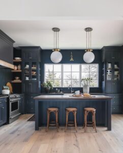 White Ball Pendant Lights Over Dark Grey Island