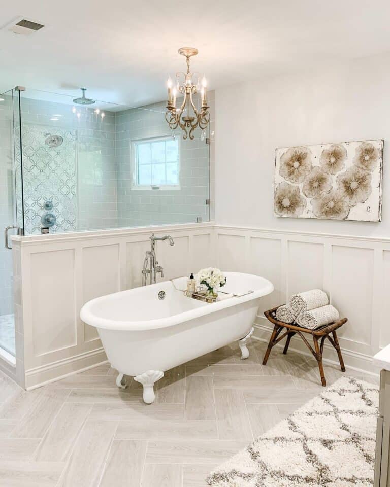 White Bathtub Next to Gray Subway Tile Shower