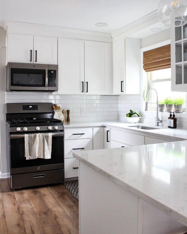 White Cabinetry with Black Metal Handles - Soul & Lane