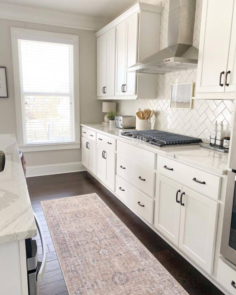 White Cabinetry with Dark Wood Floor