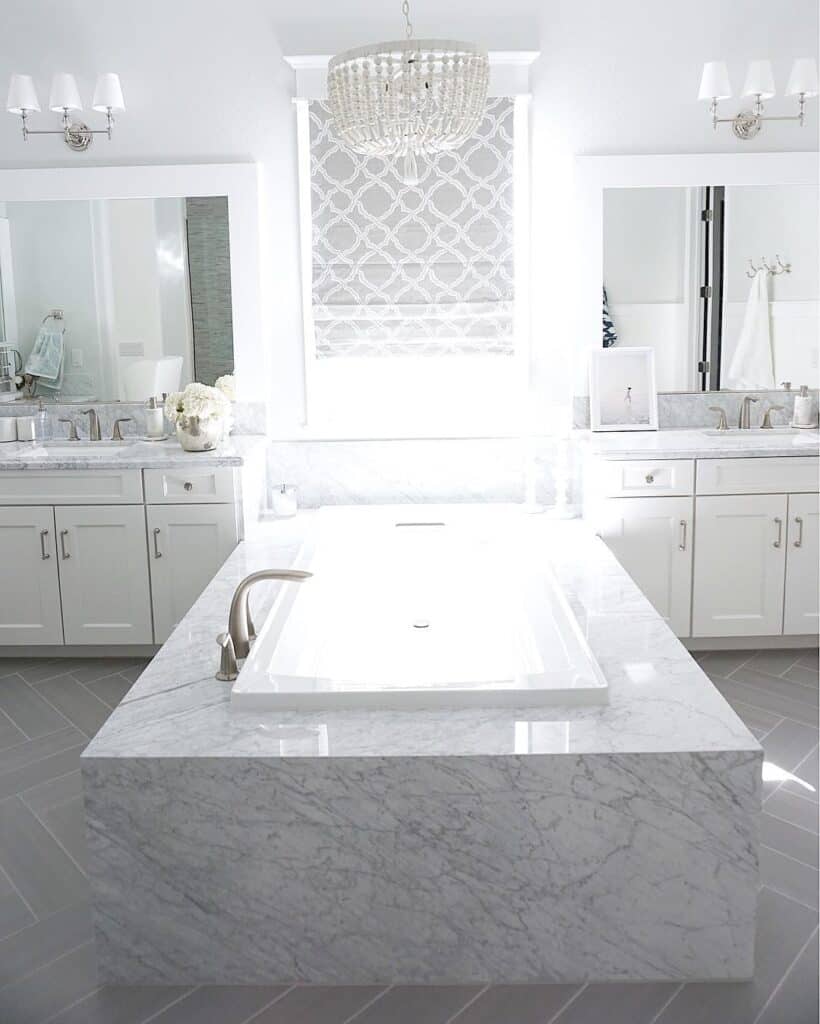 White Drop-in Tub with Light Gray Marble Ledge