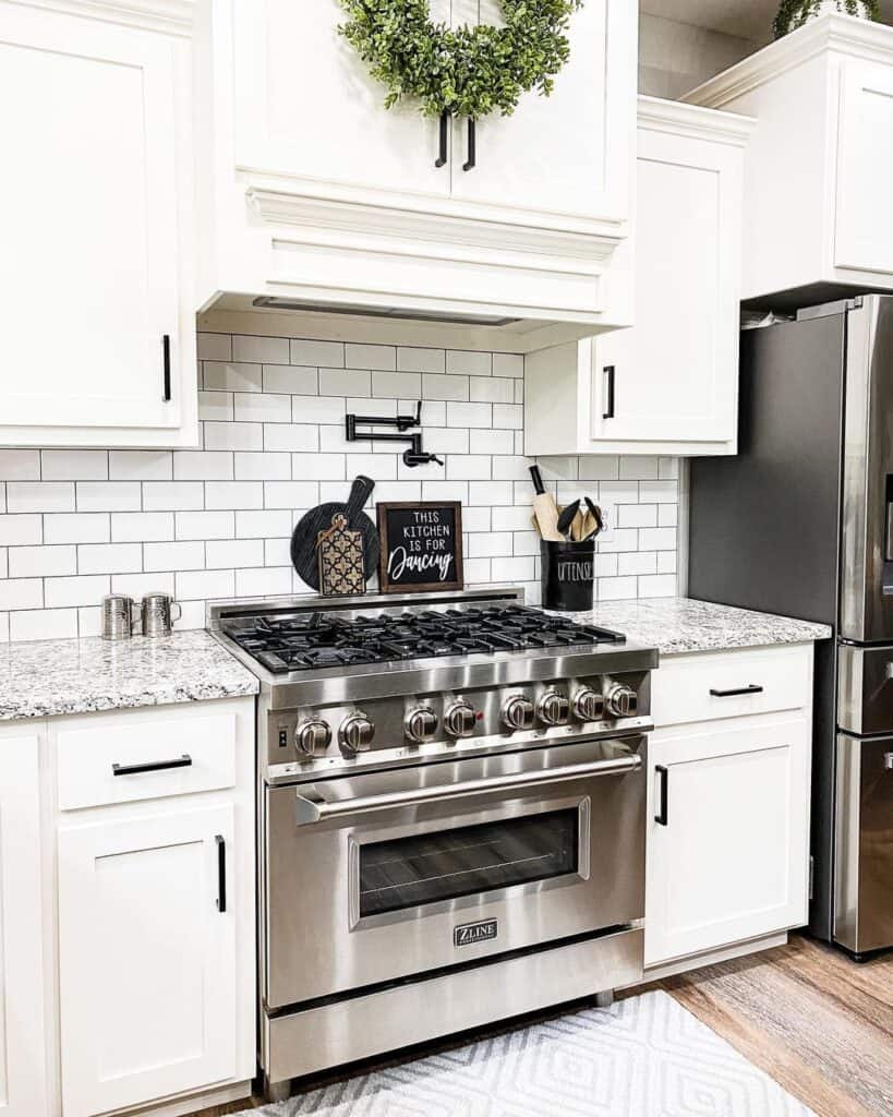 White Farmhouse Kitchen with Black Hardware