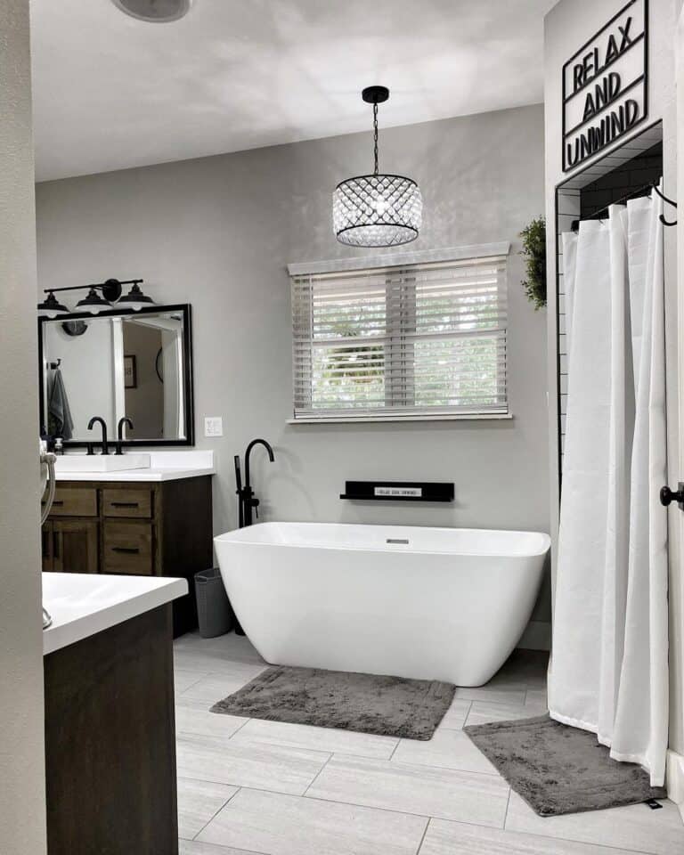 White Freestanding Tub with Black Faucet