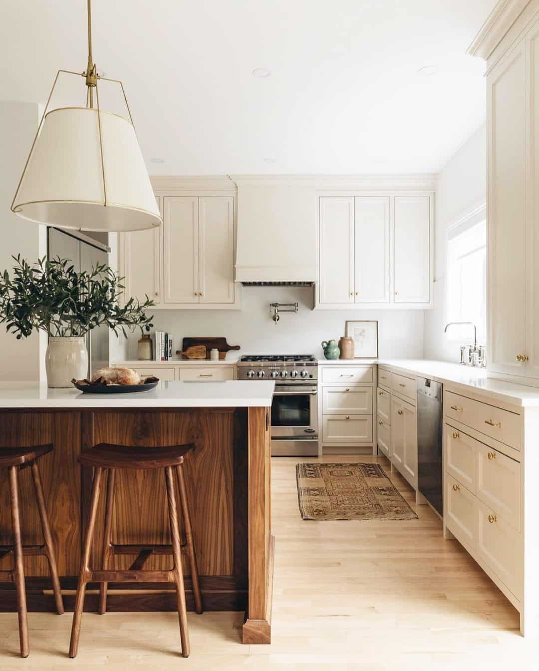 White Kitchen With Light Wood Flooring Soul & Lane