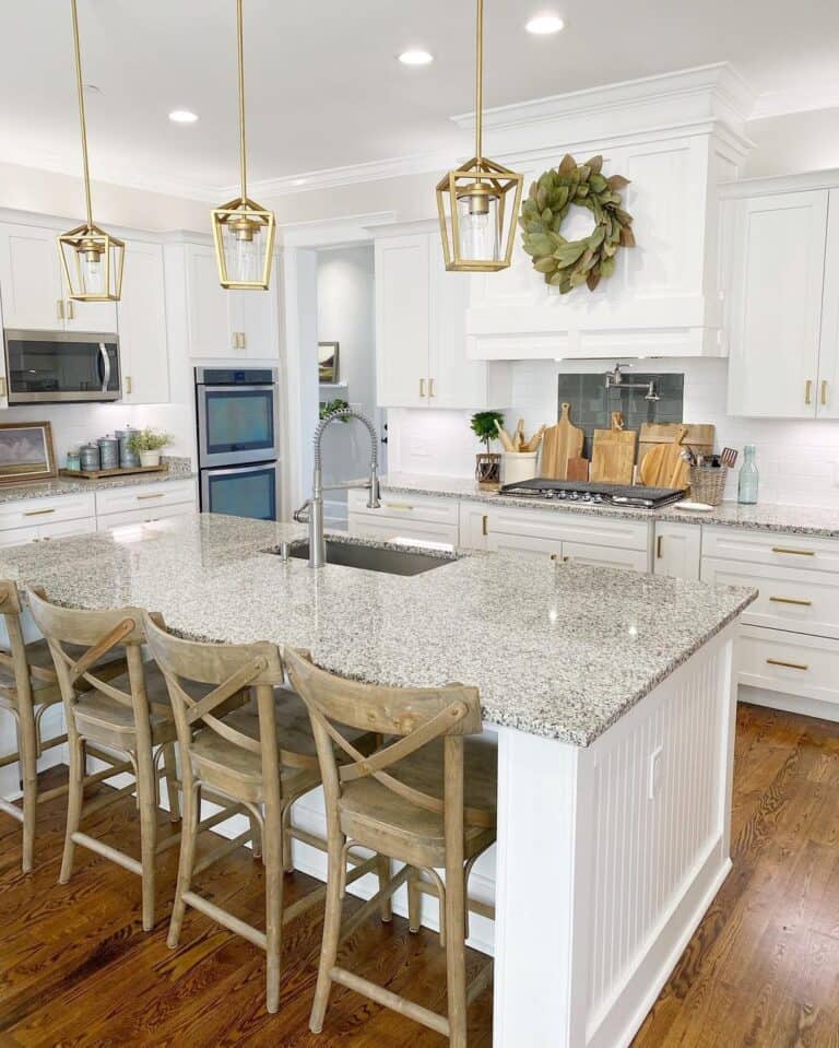 White Kitchen with Brass Pendant Lights