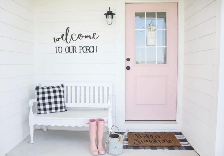 White Porch Bench and Pink Front Door