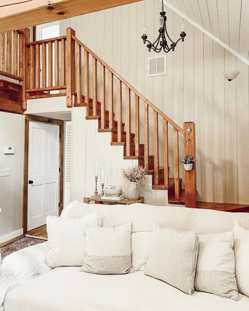 White Shiplap Cabin with White Couch