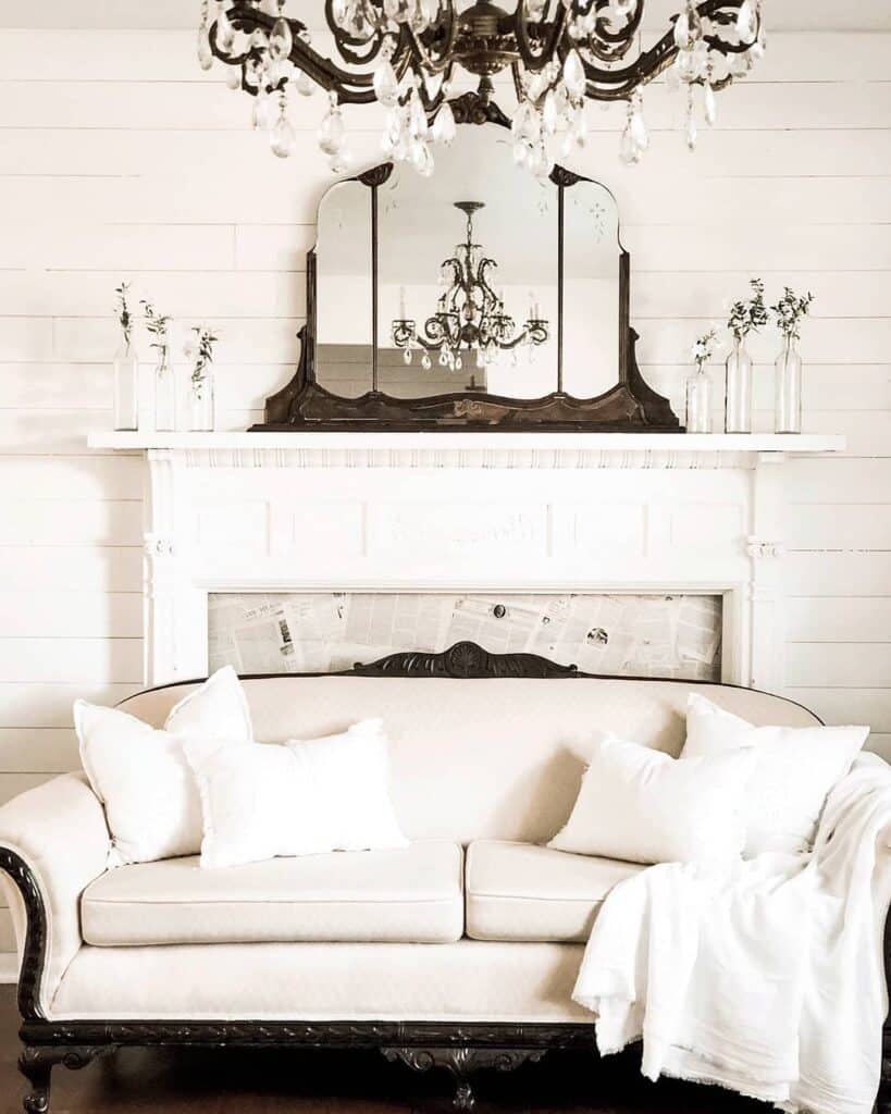 White Shiplap Wall with Ornate Mirror