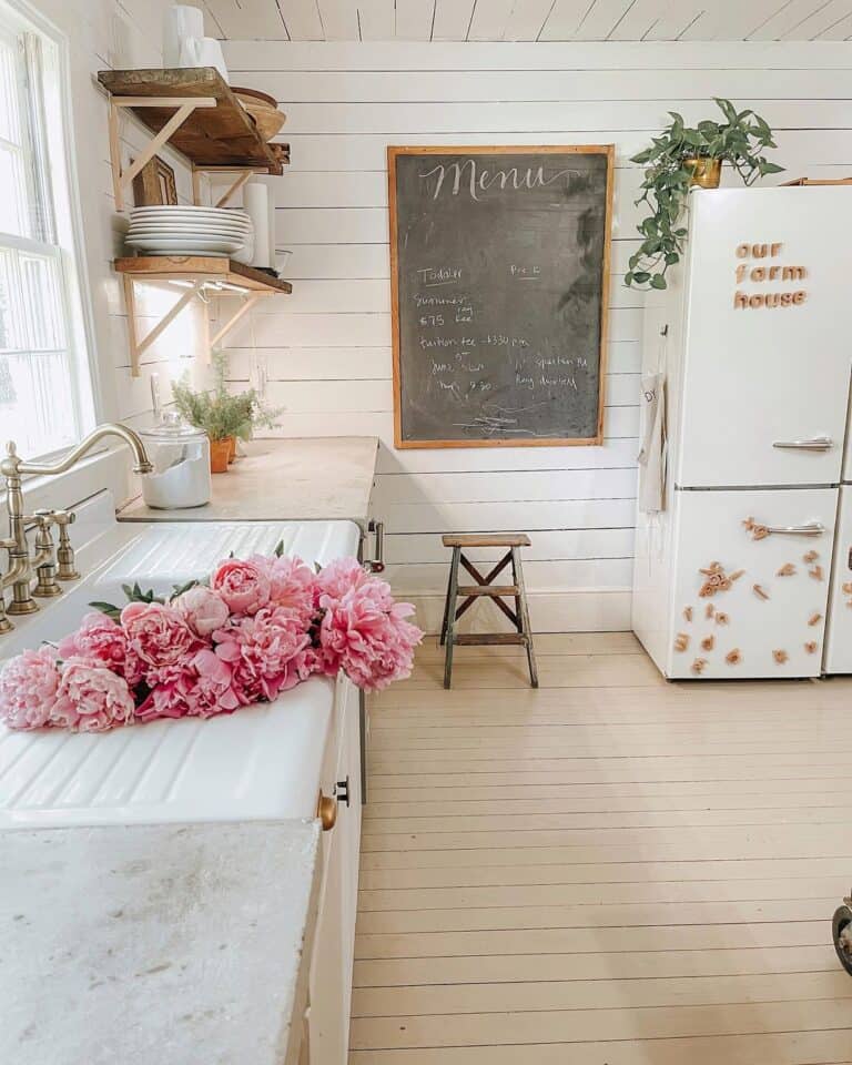 White Shiplap Walls with a White Baseboard