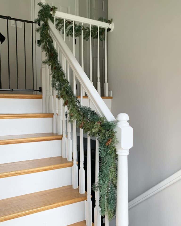 White Stair Spindles with Garland Decor