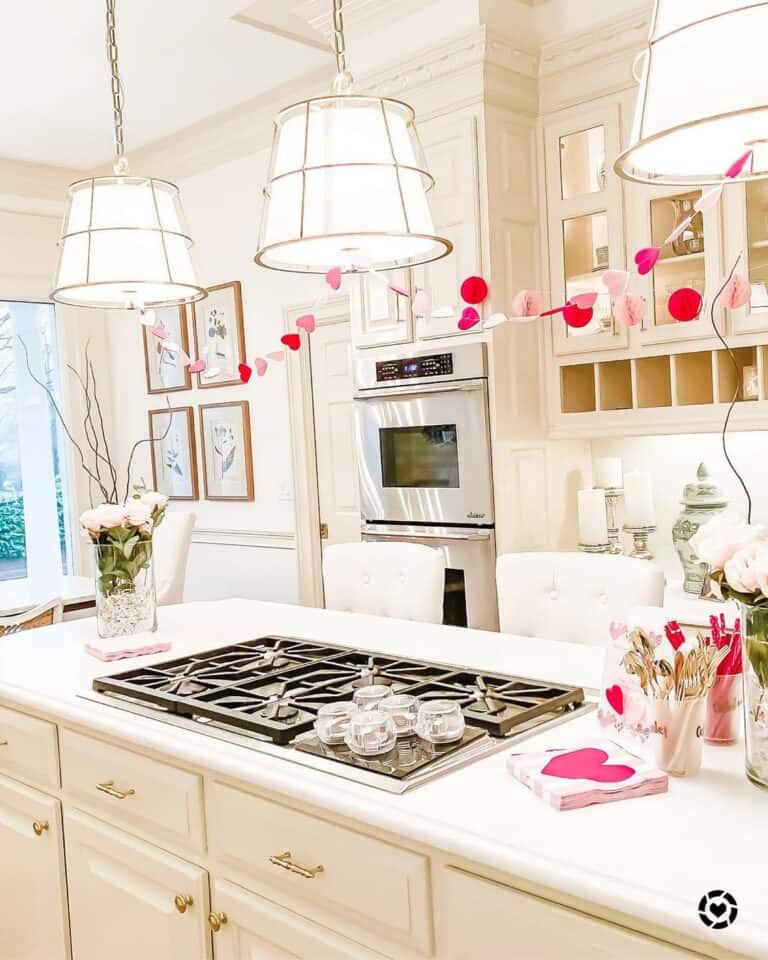 White and Gold Pendant Lamps Over White Countertop