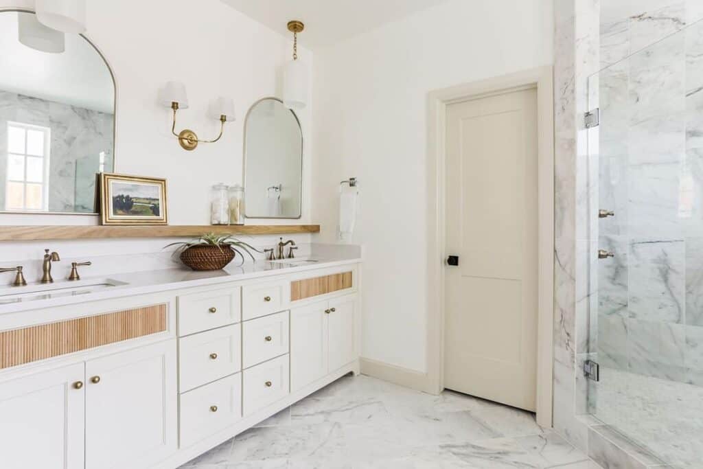 White and Wood Bathroom with Ivory Baseboards