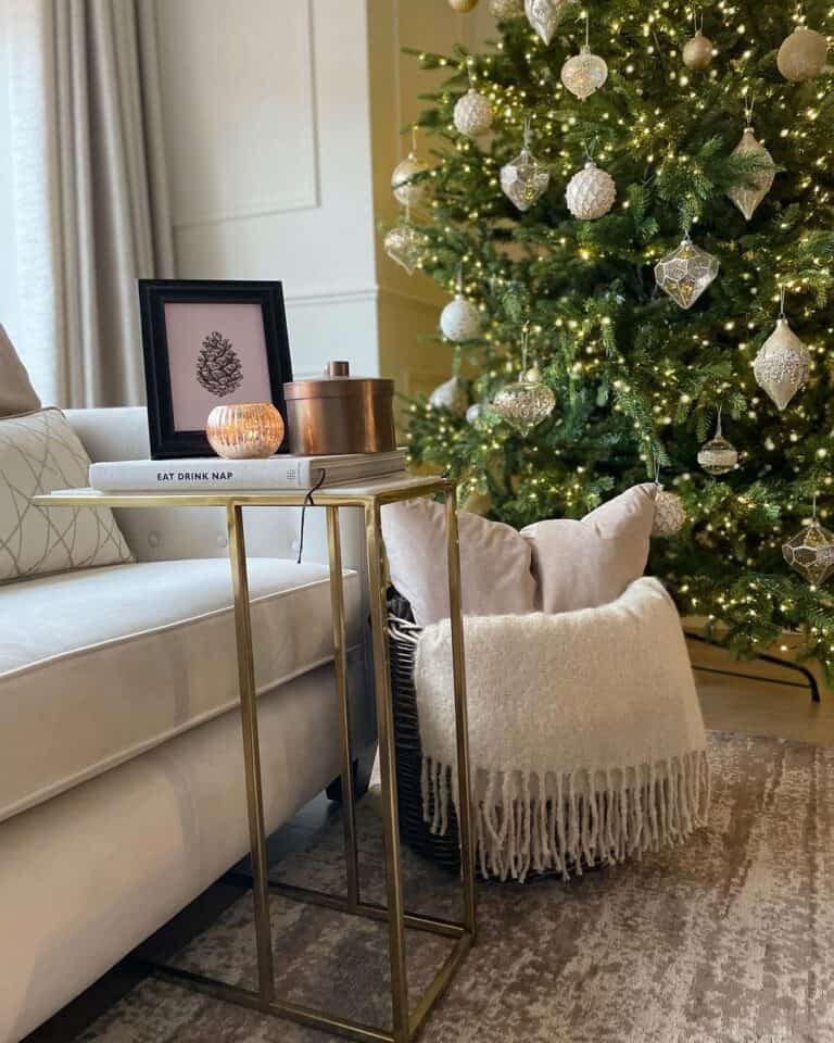Wicker Basket With Pillows and Christmas Throw