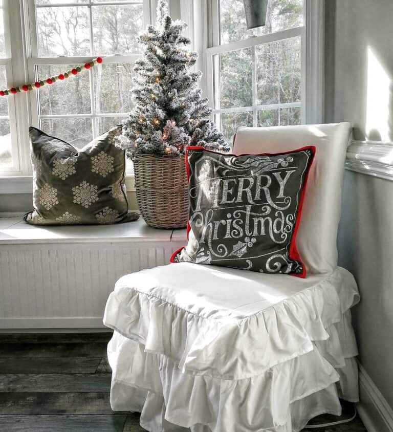 Window Seat with Dark Grey Christmas Throw Pillows