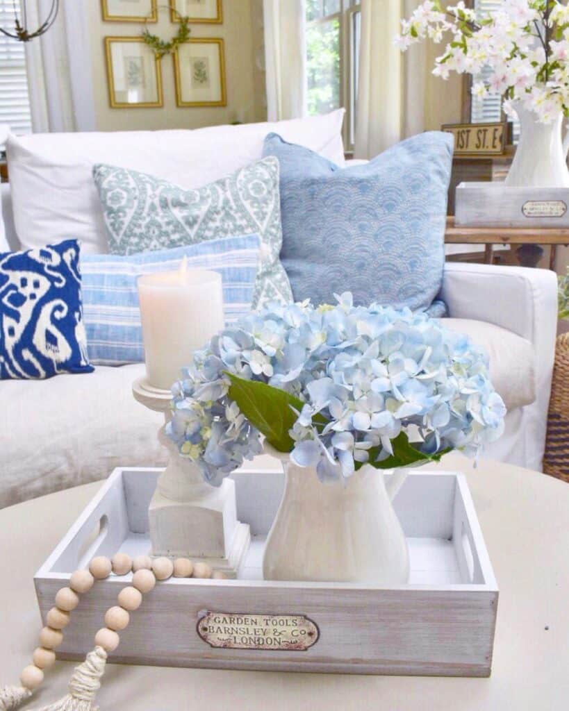 Wood Tray on a White Ottoman