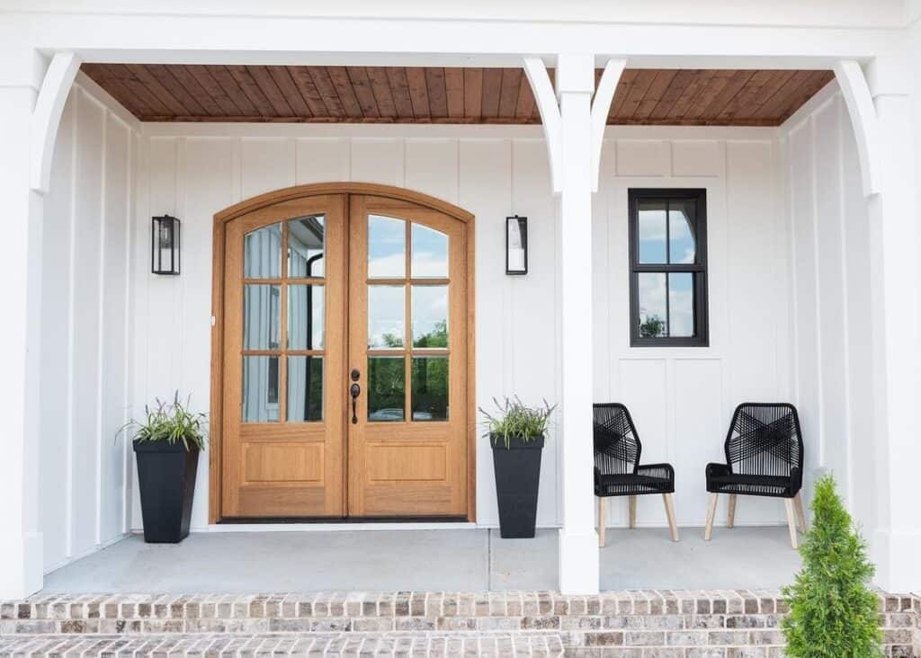 Arched Double Doors and Black Sconces