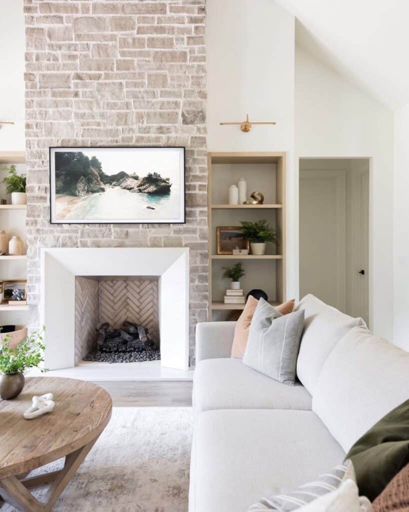 Beach Fireplace Artwork on Whitewashed Stone Wall