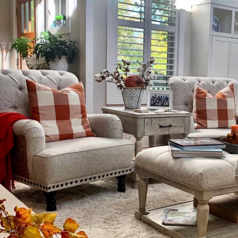 Beige Armchairs with Red and White Checkered Throw Pillows