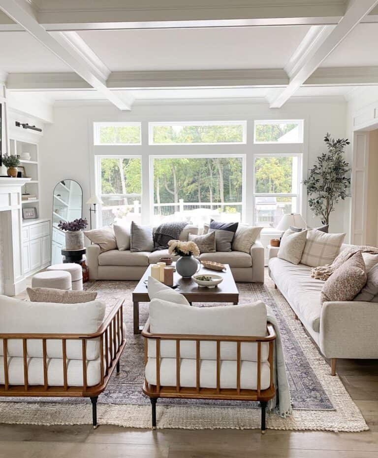Beige Couches with White and Wood Spindle Chairs