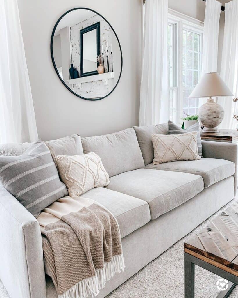 https://www.soulandlane.com/wp-content/uploads/2022/08/Beige-Patterned-Throw-Pillows-for-Grey-Couch-819x1024.jpg
