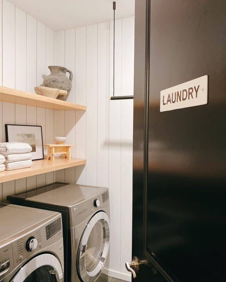 Black Door with Laundry Room Sign