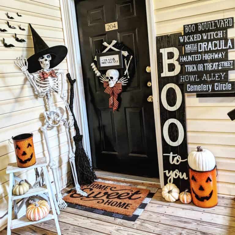 Black Front Door with Halloween Decor