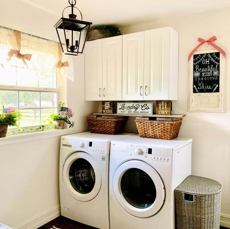 Black Lantern Lighting in White Laundry Room