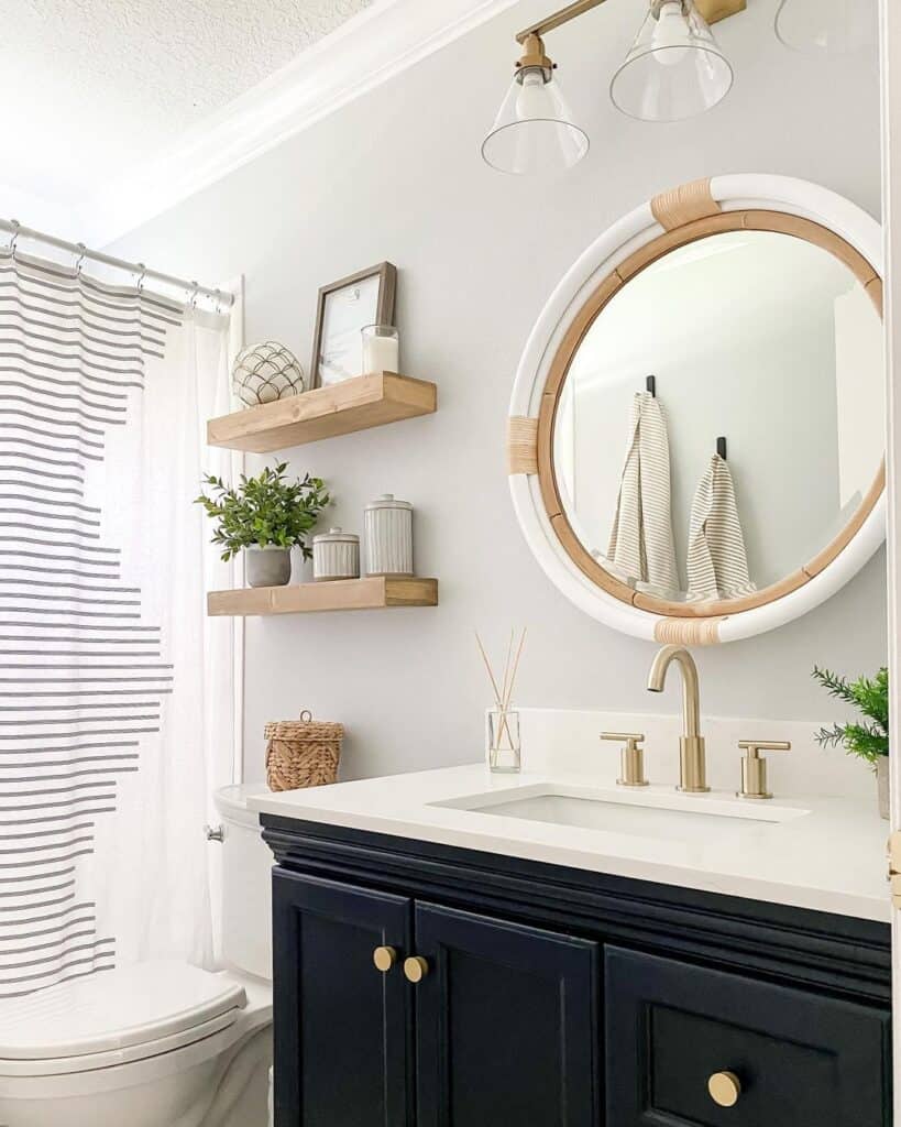 Black Vanity with Gold and Glass Lighting