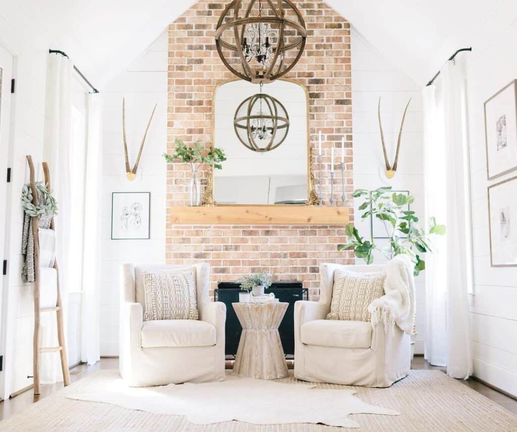 Brick Fireplace with Gold Frame Mirror