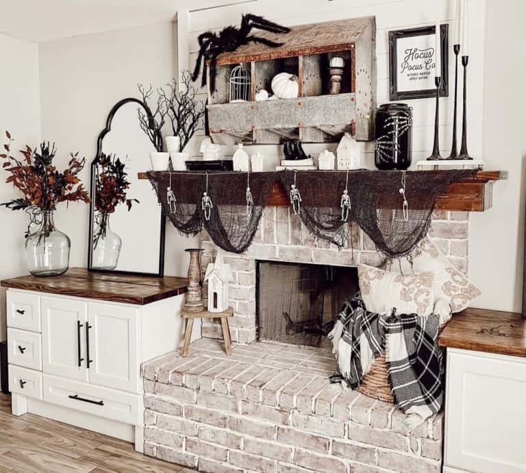 Brick Fireplace with Halloween Spider Web Decorations
