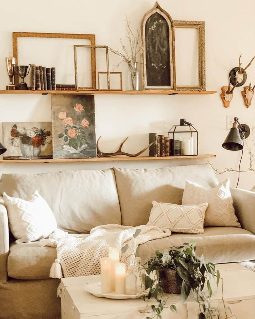 Carefully Accessorized Floating Shelves Above Couch