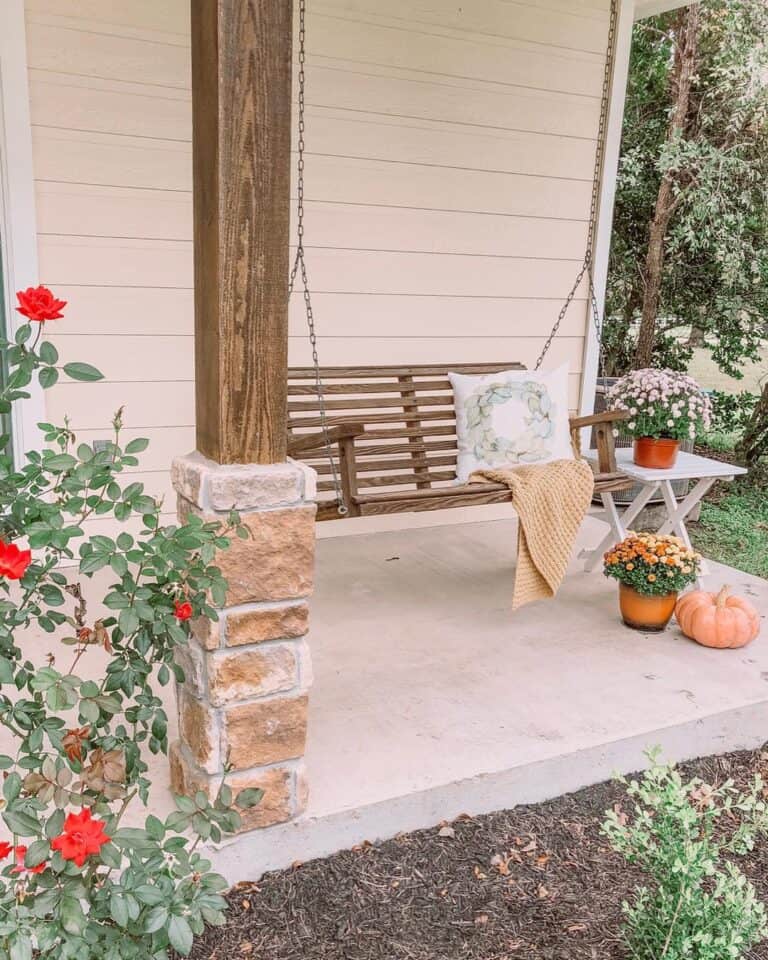 Charming Fall Décor Beside Porch Swing