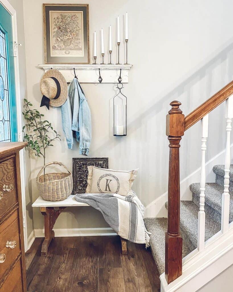 Entryway with Carpeted Stairs and White Trim